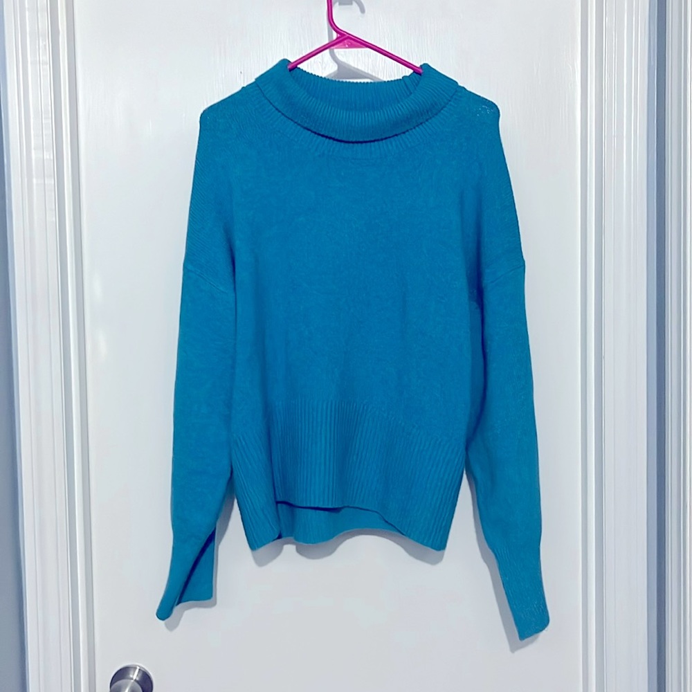 Never worn sweater.